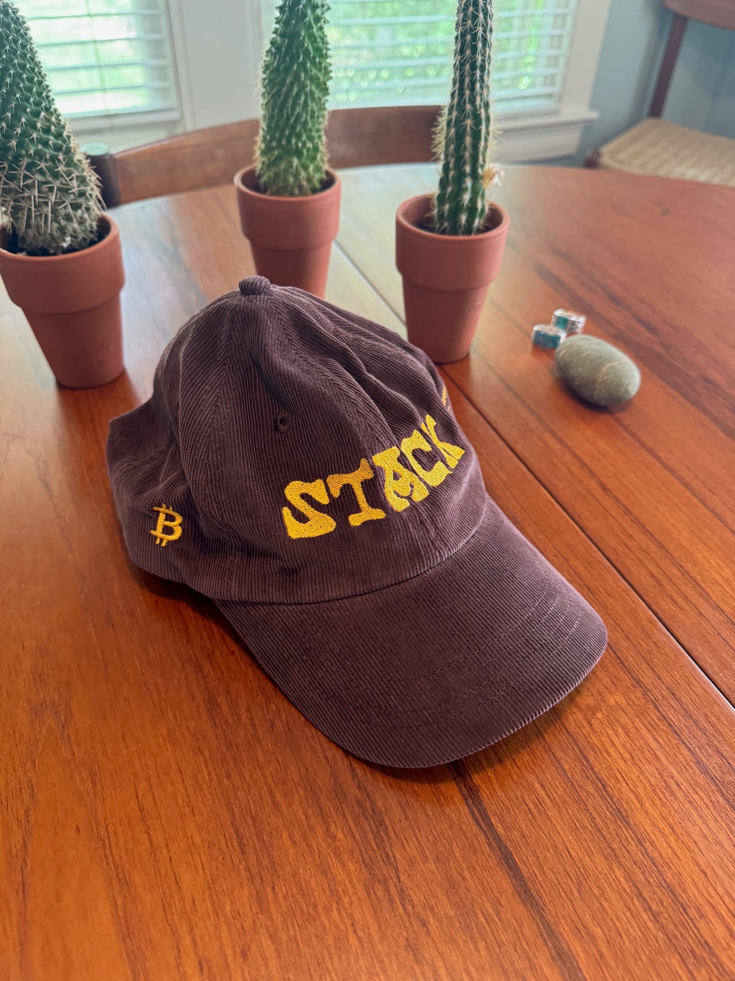 Brown corduroy cap with yellow 'Stack' text and bitcoin logo for retro style - Sovereign Goods.